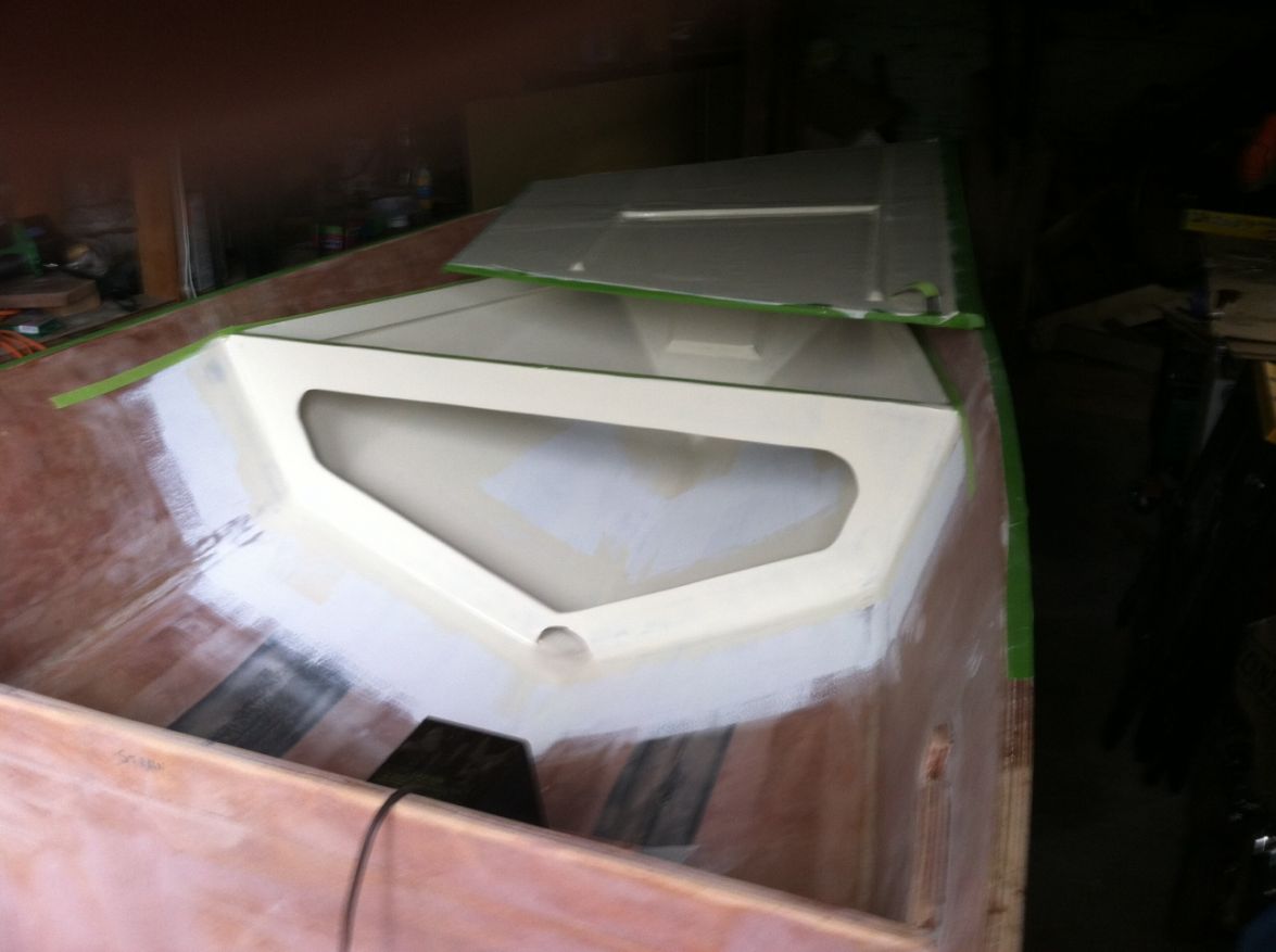 Anchor locker with primer and first coat of paint
Plan to Kiwi where there is white primer and items will sit in this compartment

